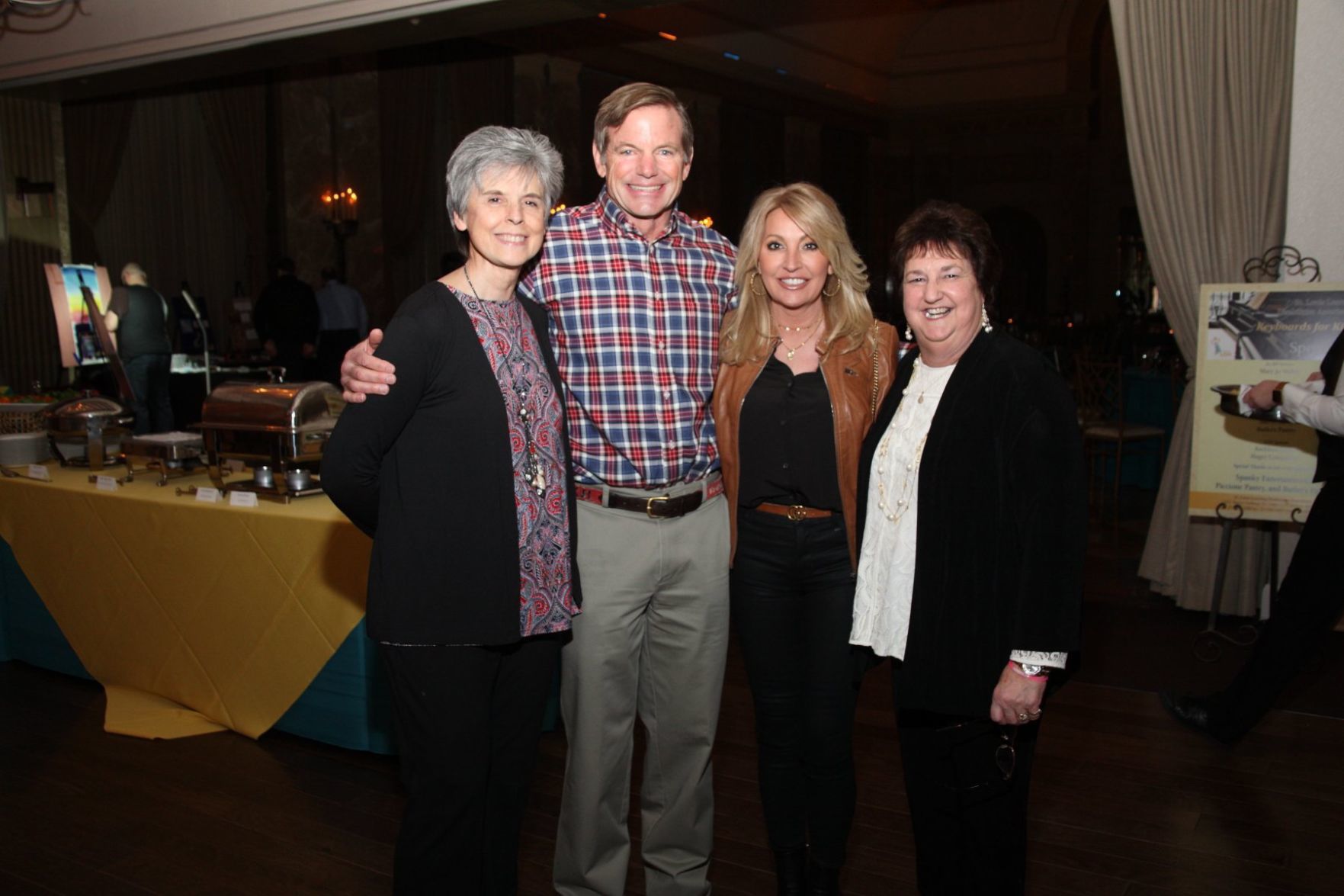 Board Chair Sheryl Silvery, Billy and Christi Busch, CEO Pam Kortum